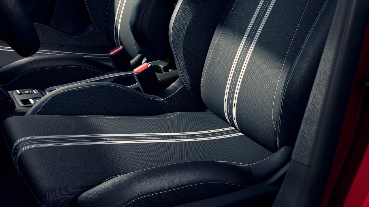Close-up of Opel Corsa Electric 2-tone black and grey patterned seat